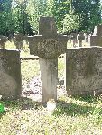 Strz. Aleksander Korbuszewski upami�tniony mieczokrzy�em betonowym z imienn� inskrypcj� epitafijn� na jednej z mogi� zbiorowych Cmentarza Wojskowego w Warszawie, ul. Pow�zkowska. Stan z dn. 15 czerwca 2017 r. (fot. udost�pni� Bogus�aw Pisarek).