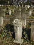 Zdj�cie symbolicznego miejsca poch�wku mjra Zygmunta Roszkowskiego na cmentarzu wojskowym na Pow�zkach w Warszawie. Foto Alfred Nowi�ski.